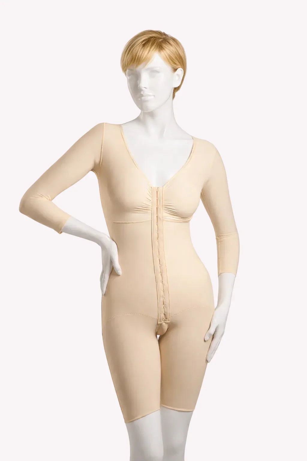 Mannequin wearing a beige body shaper against a white background