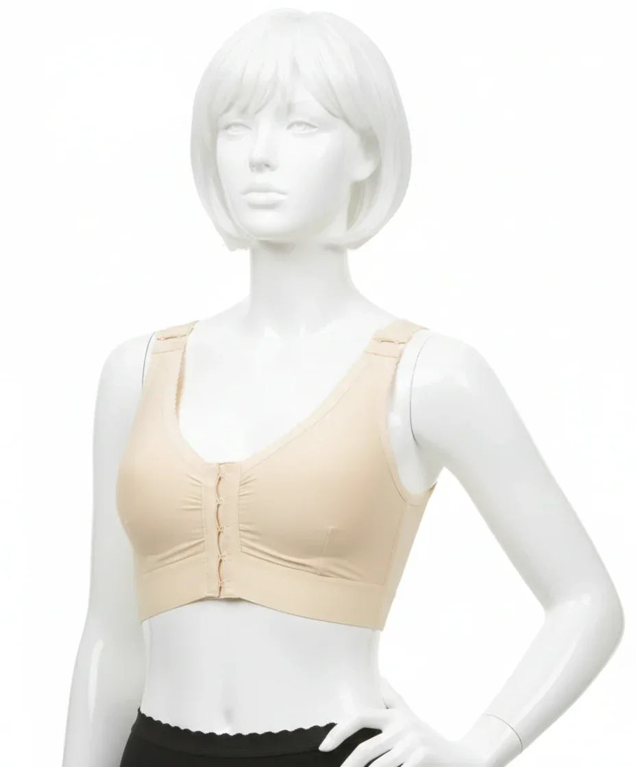 Beige post-surgical compression bra with front closure on mannequin