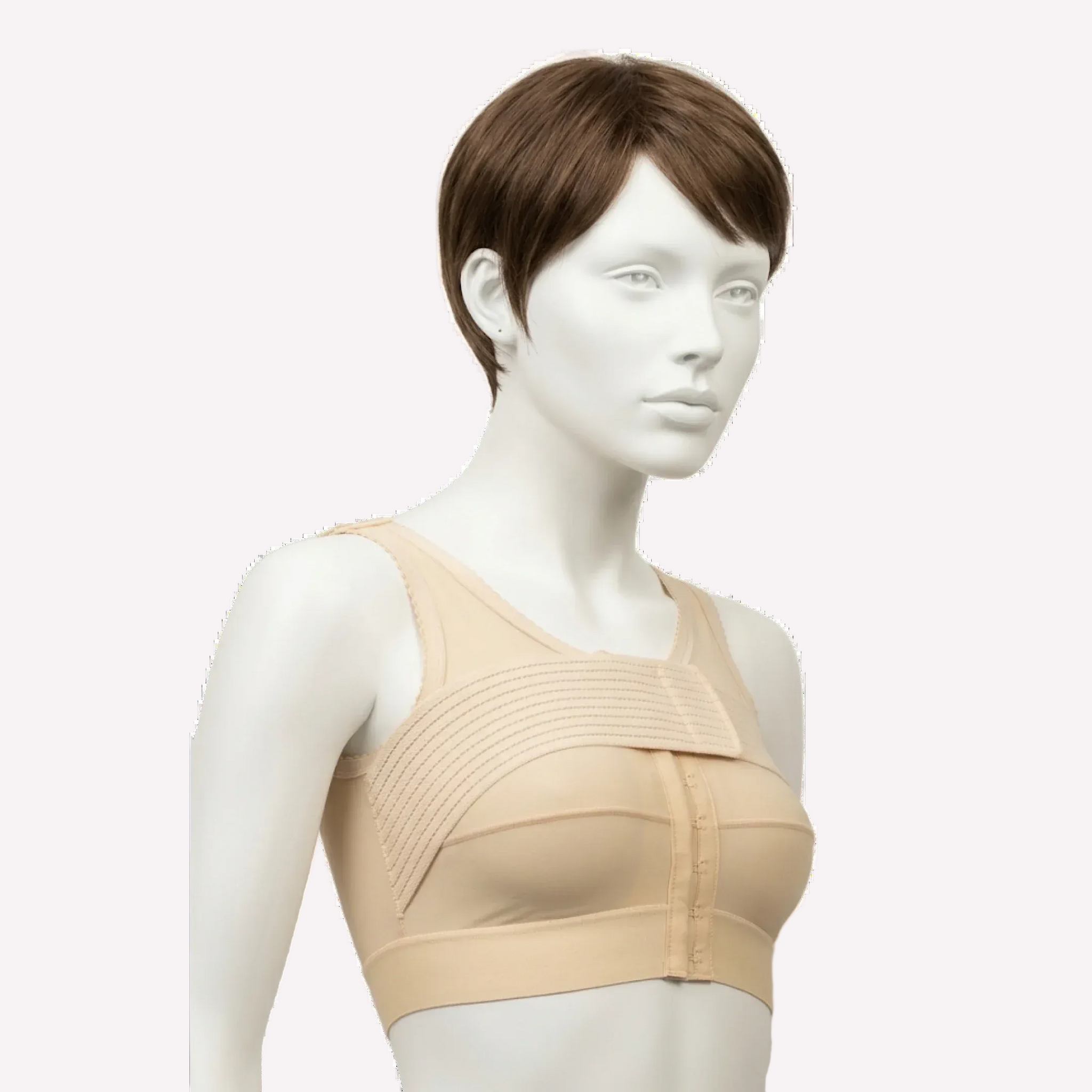 Mannequin wearing beige post-surgical compression bra with front closure and chest strap