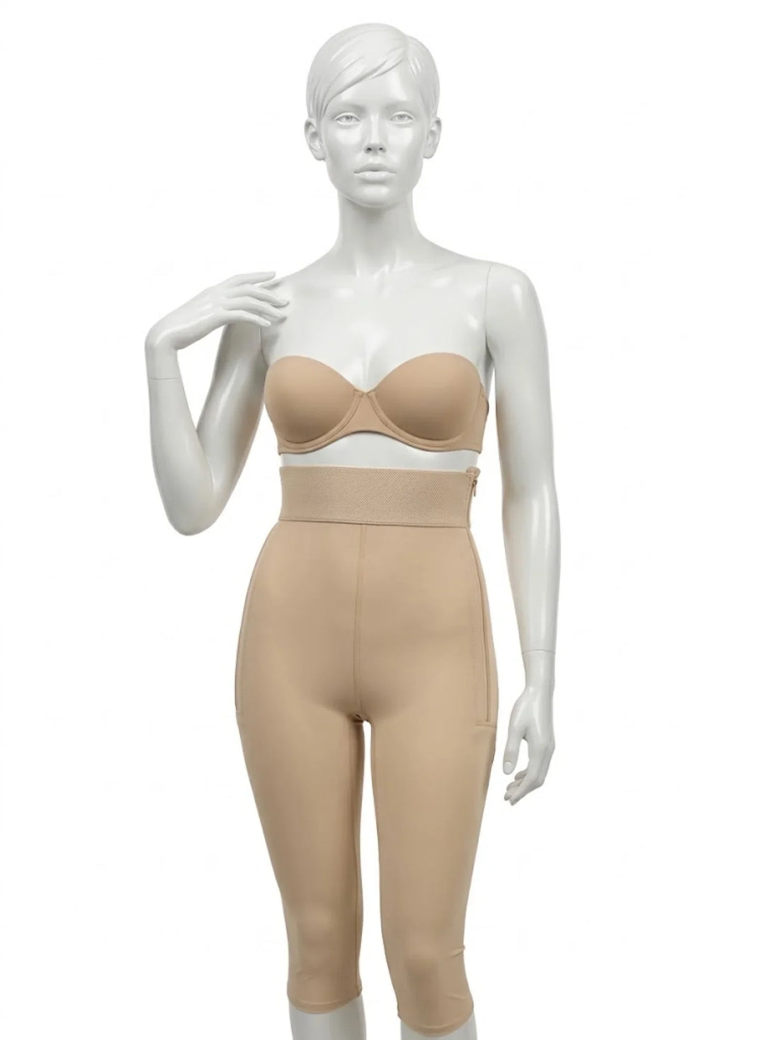 Mannequin wearing beige compression garment capri for post-surgery recovery