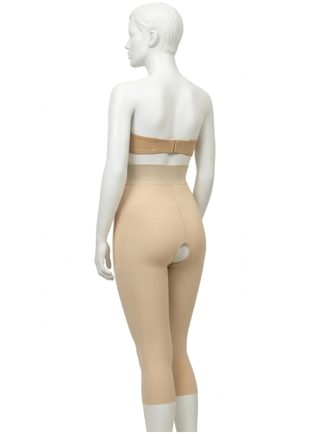 Back view of mannequin wearing beige medical compression garment leggings with open crotch