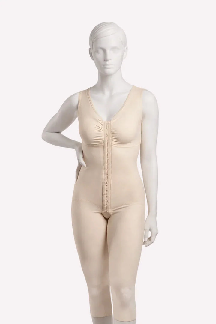 Beige bodysuit on a mannequin against a white background