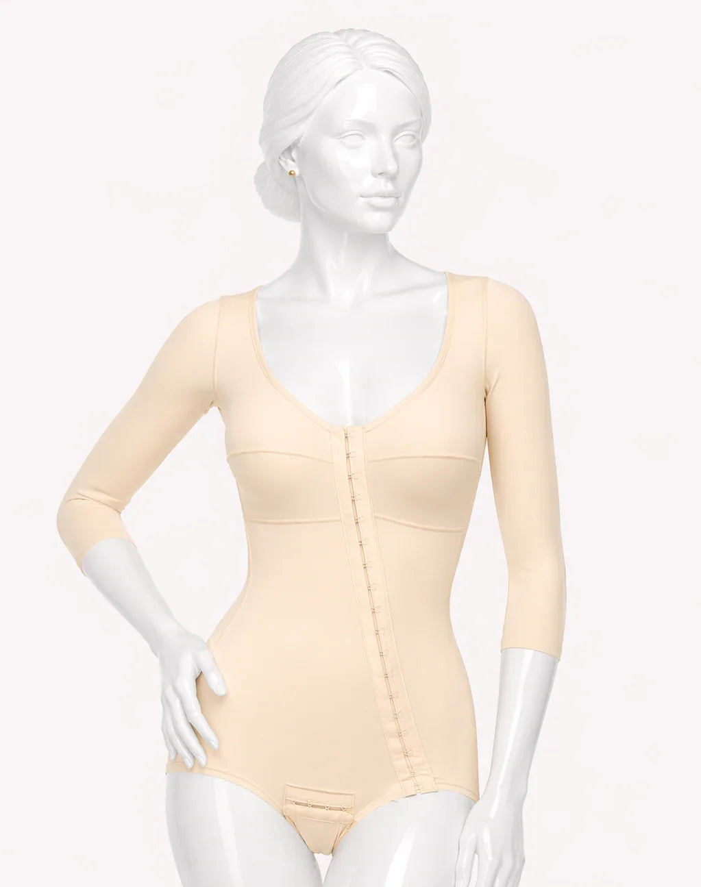 Mannequin wearing a beige bodysuit on a white background