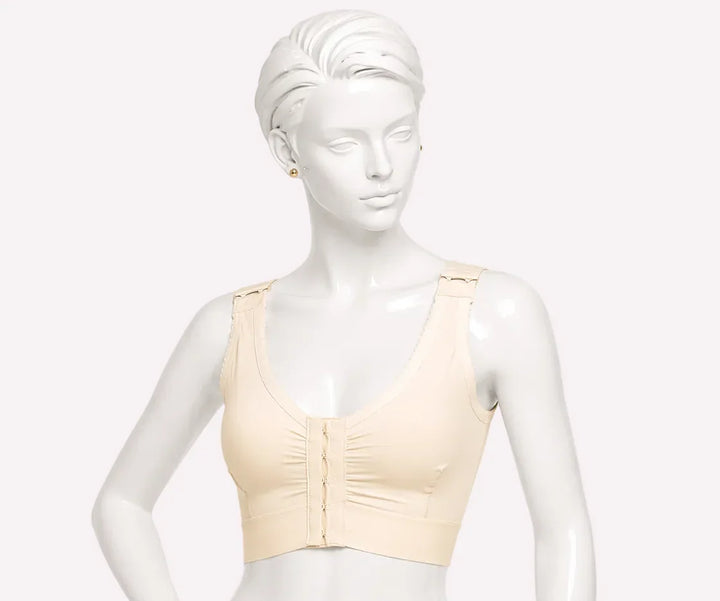 Beige bra on a mannequin against a white background